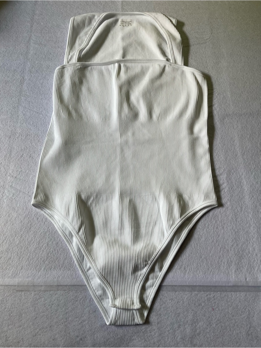 NWOT’S OQQ Women’s White Ribbed Bodysuit